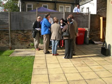 Councillors in the garden behind 107-111 Churchfield Road