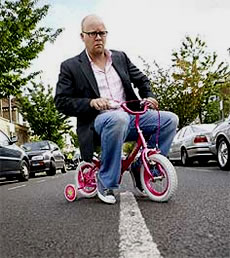Toby Young on bike