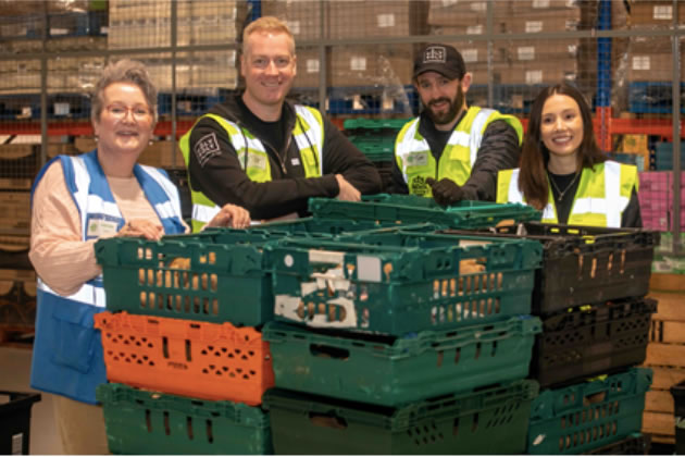 Left to right: City Harvest London CEO Sarah Calcutt and Holy Moly’s co-founder Tom Walker, head of sales Tom Coen and senior category manager Adrienne Hudson