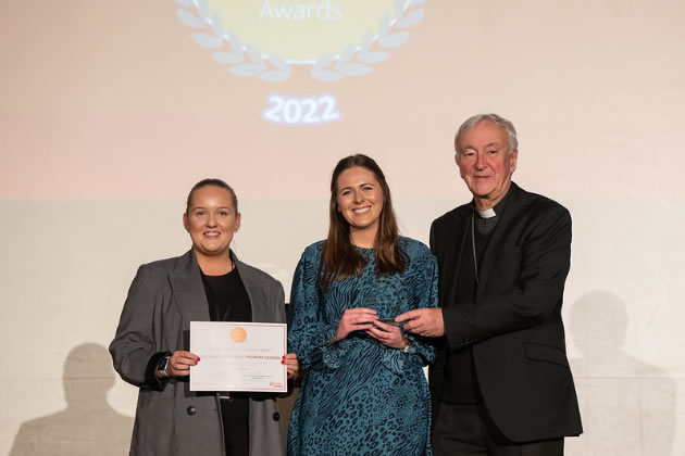 Teacher Ann-Marie McDaid accepting the award from Cardinal Vincent Nichols 