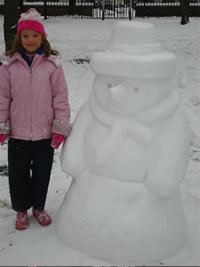 Snowman sculpture with friend