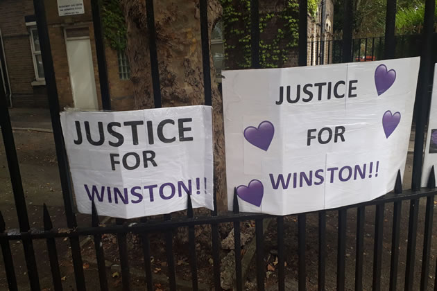 Banners outside Wormwood Scrubs on anniversary of his death