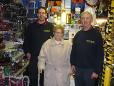 The Woolsey Family in their Bike Shop