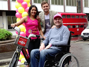 West Ham full-back and England player Carl Jenkinson joined him to cheer the cyclists home