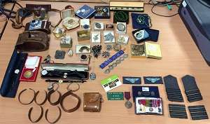 selection of medals watches jewels found by police