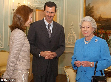 Globe-trotting: Asma and Bashar Assad meeting the Queen at Buckingham Palace
