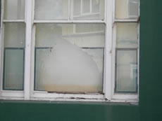 Broken window Goldsmith Road W3